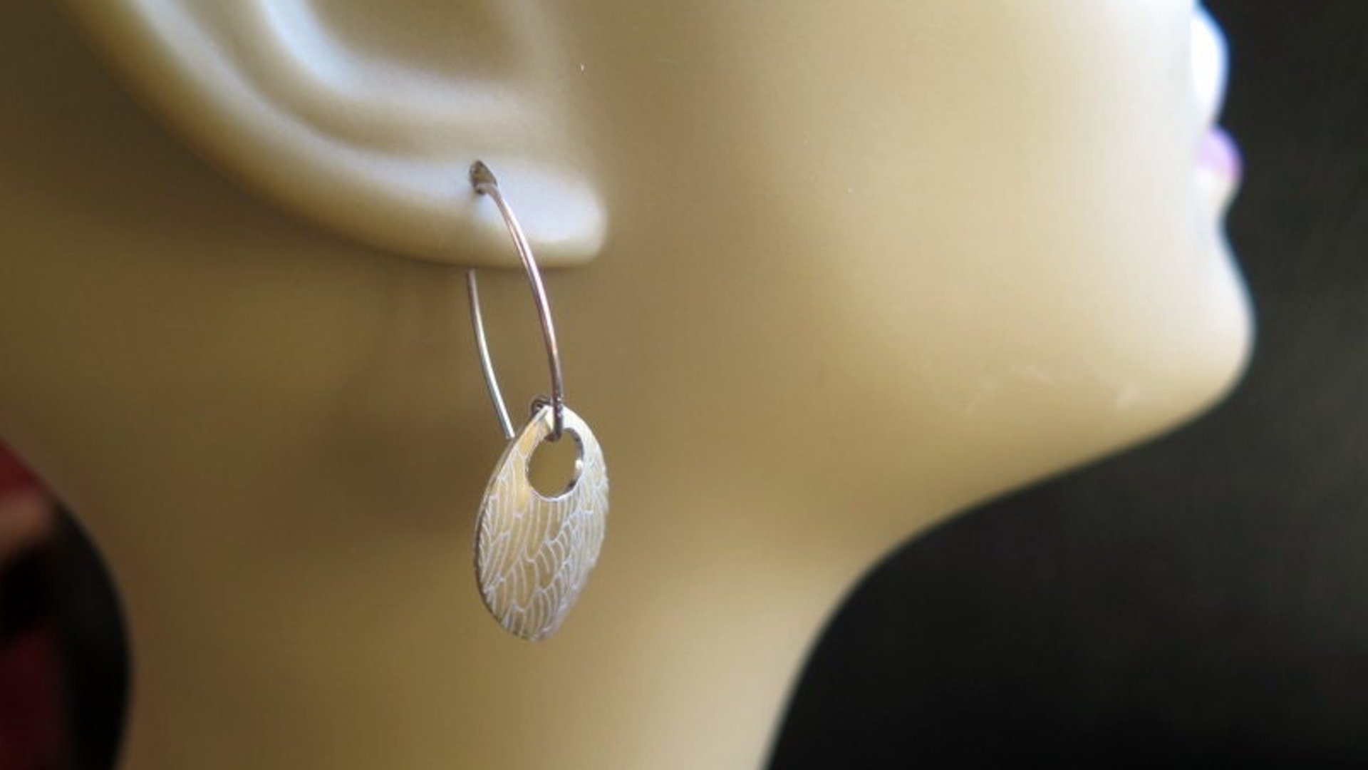 feather earring in anodized aluminum. sterling silver dangle earrings.