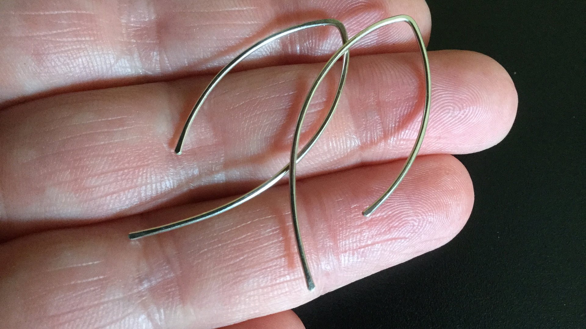 sterling silver threader earrings. simple jewelry. open hoops. modern wire earings.