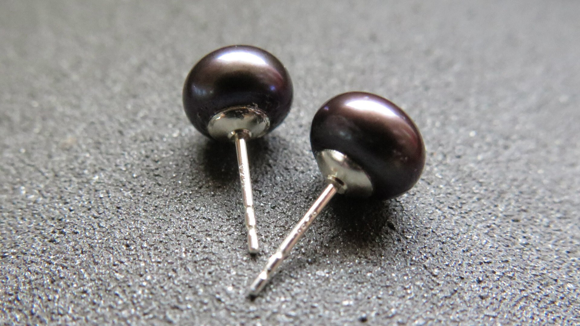 peacock black pearl earrings. pearl studs. 6.5mm to 7mm pearls on sterling silver posts.