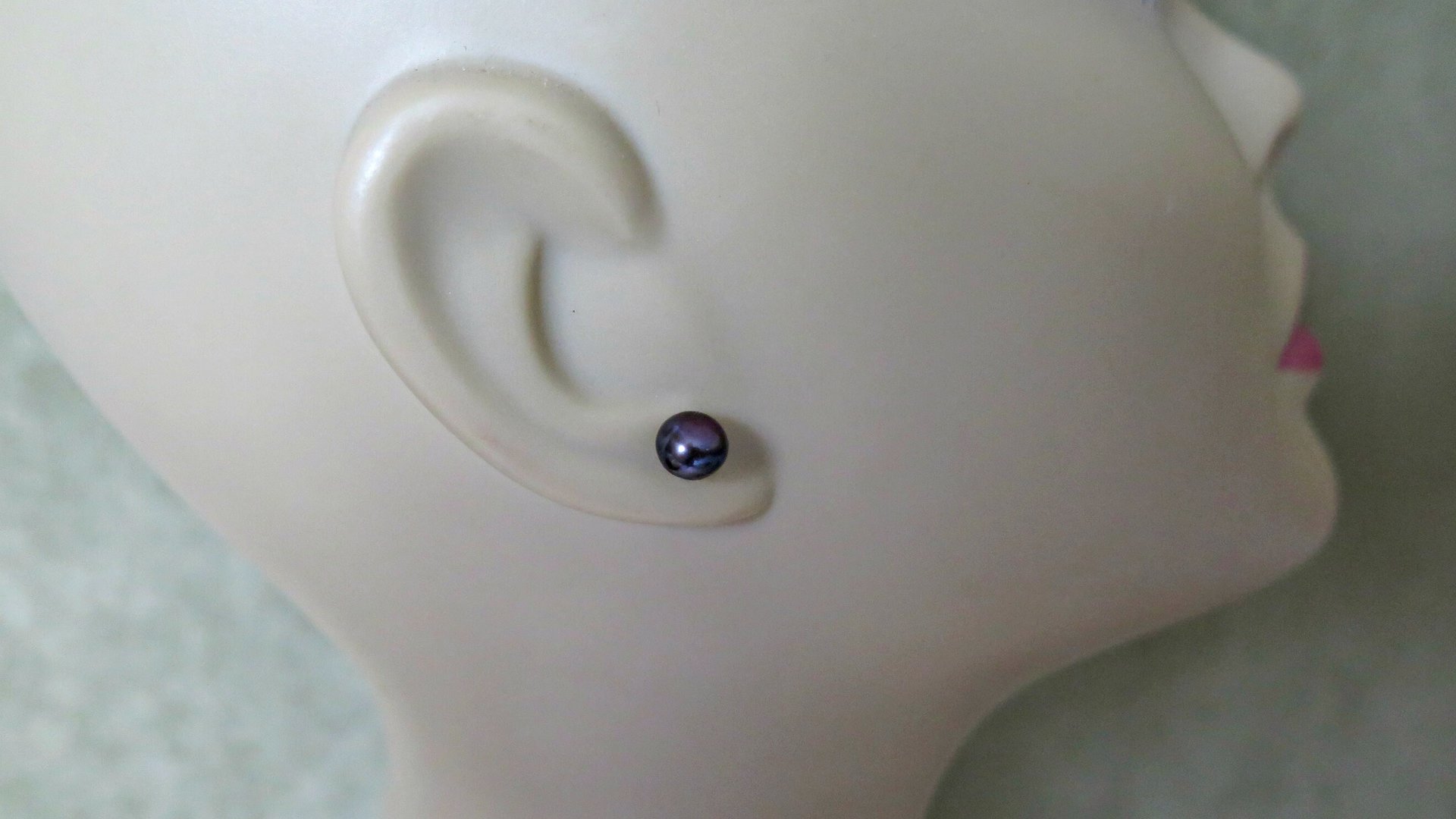 peacock black pearl earrings. pearl studs. 6.5mm to 7mm pearls on sterling silver posts.