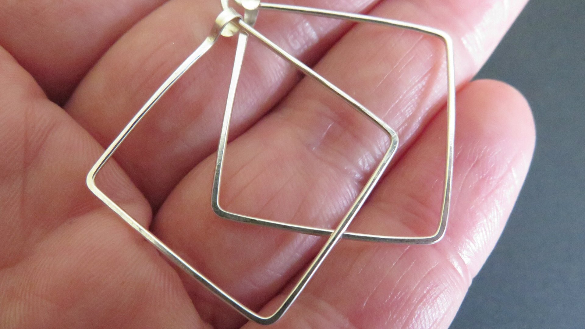 sterling silver hoops. 1 inch square earrings. geometric jewelry. splurge. available in niobium wire
