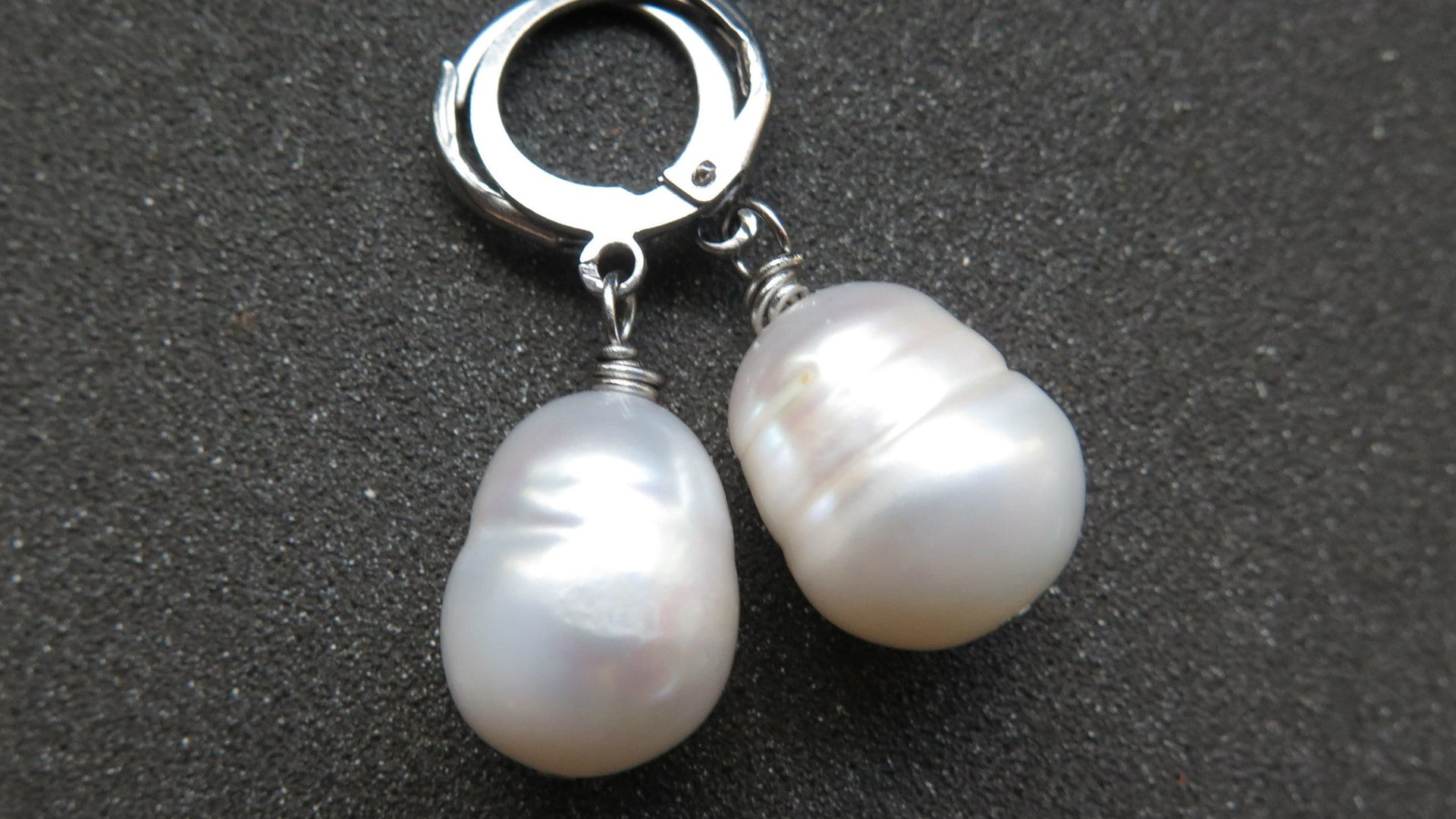 white pearl drop earrings. large freshwater pearl dangles. hypoallergenic stainless steel hoops. made in Canada.