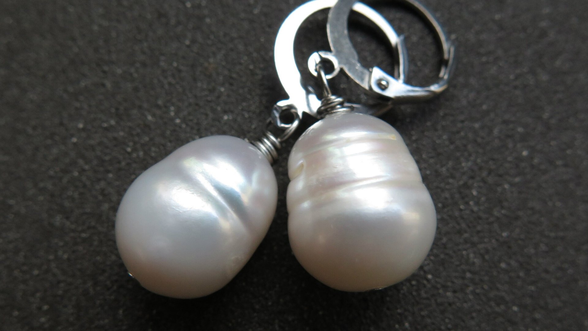 white pearl drop earrings. large freshwater pearl dangles. hypoallergenic stainless steel hoops. made in Canada.