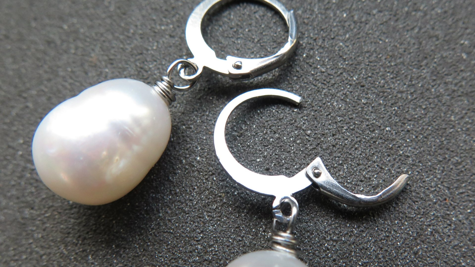 white pearl drop earrings. large freshwater pearl dangles. hypoallergenic stainless steel hoops. made in Canada.