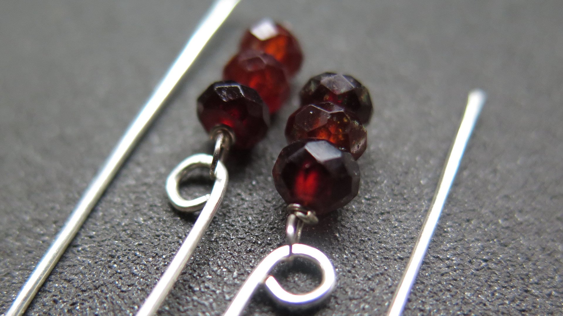 hessonite garnet earrings. burnt red stone jewelry. silver dangle earings.