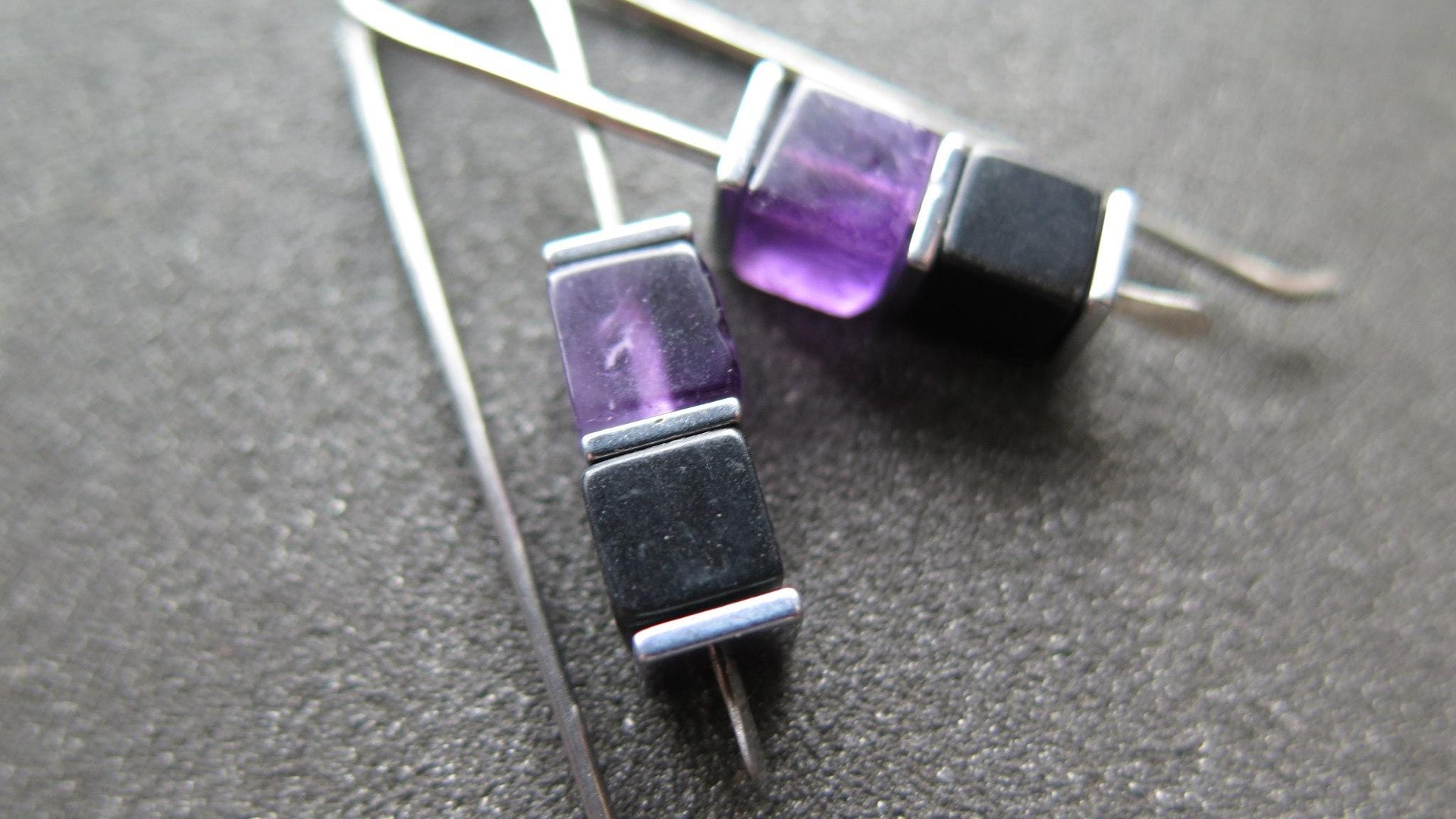 amethyst and black onyx earrings with hematite. hypoallergenic niobium for sensitive ears. modern cube jewelry.