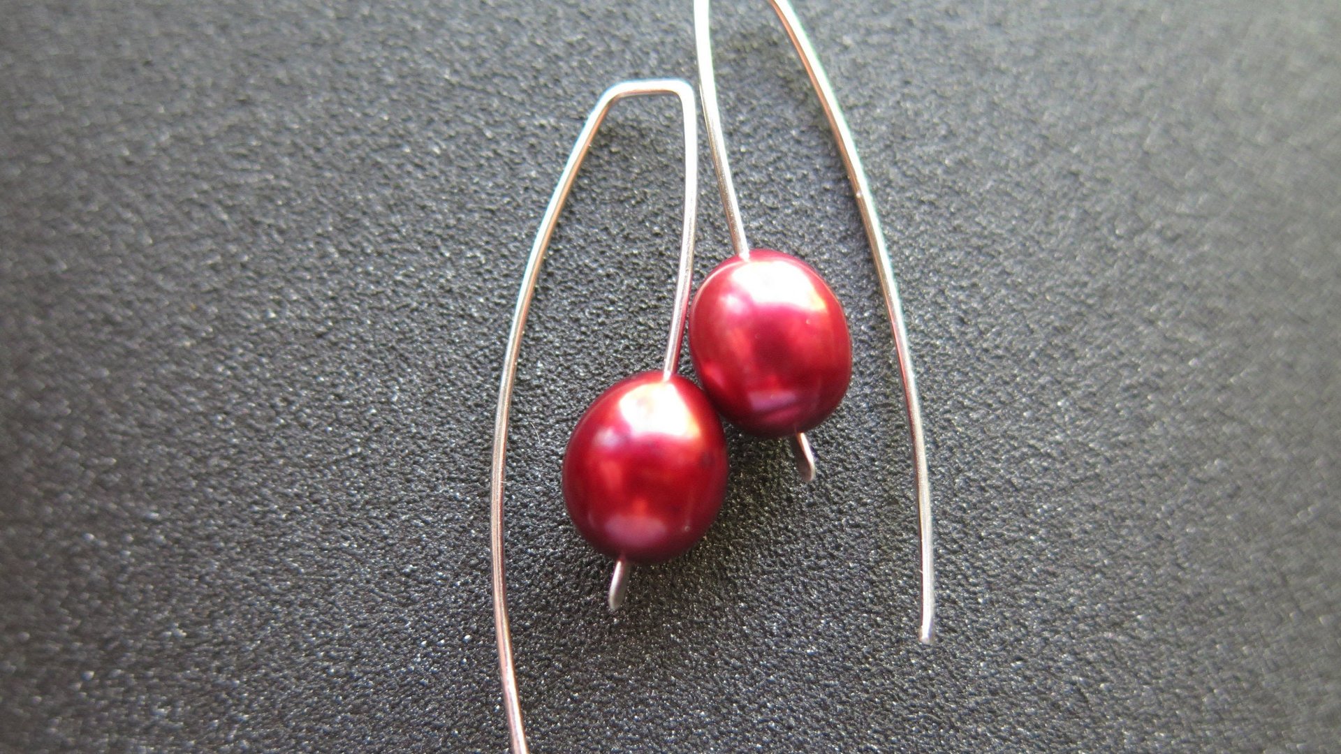 red pearl earrings in sterling silver. modern freshwater pearl jewelry. 1 1/2” drop earrings. made in Calgary, Canada