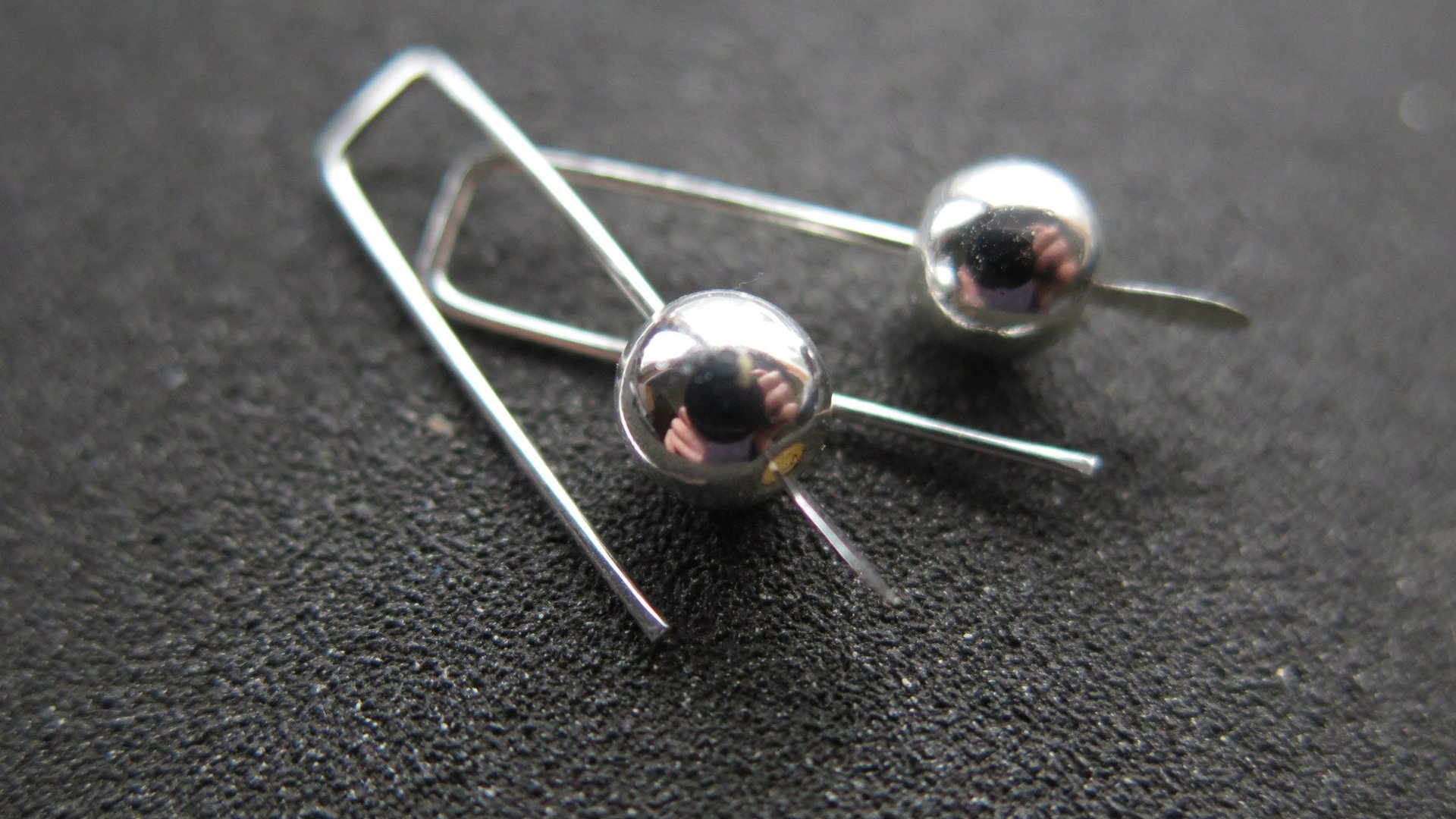small silver earrings. simple modern jewelry. 1 inch earrings. made in Calgary