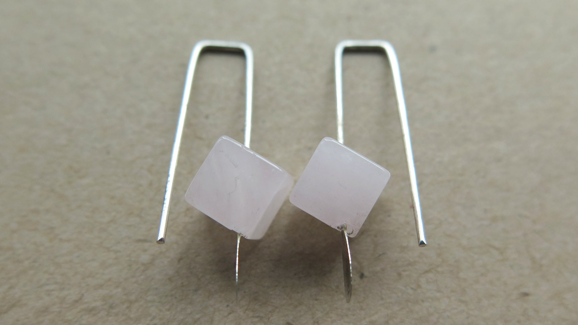 small rose quartz earrings in pale pink and silver. quartz jewelry. cube earrings for women