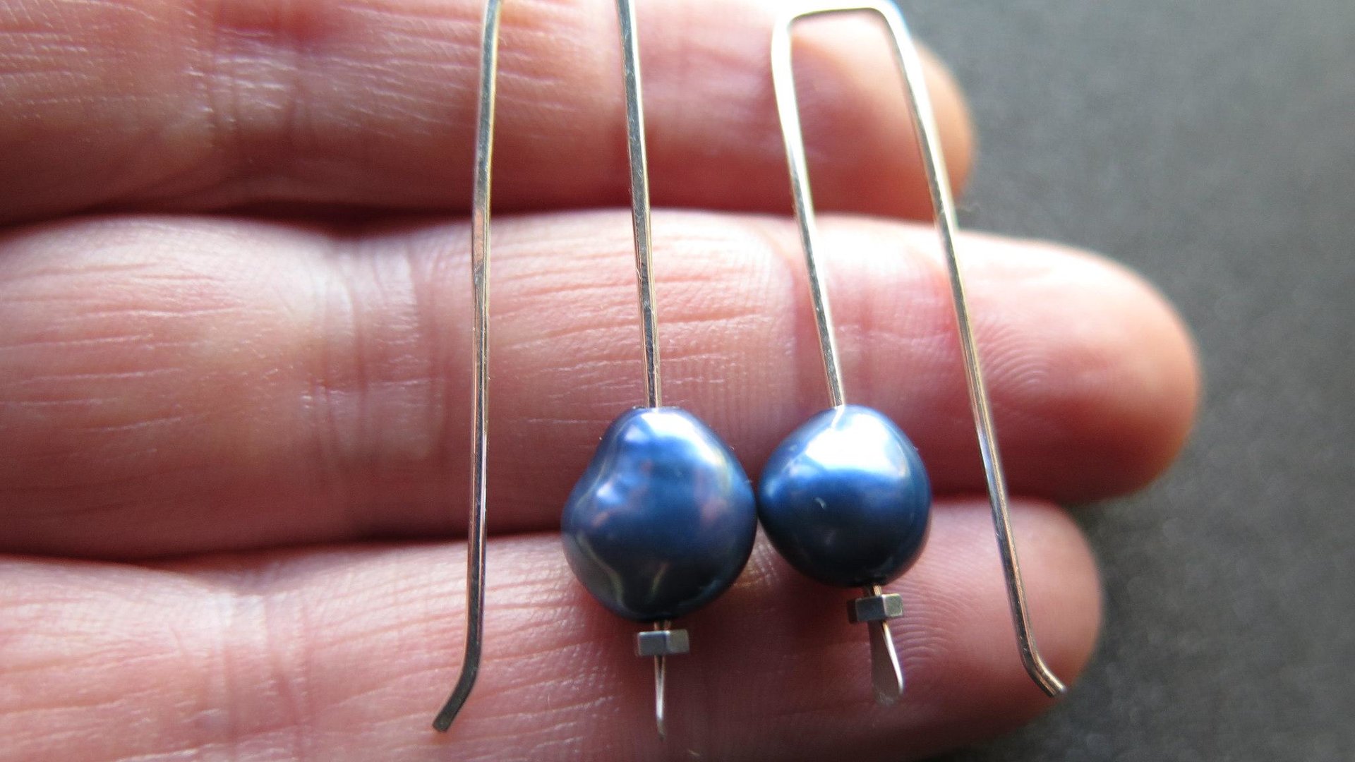blue pearl earrings in sterling silver. modern freshwater pearl jewelry. 1 1/2” drop earrings. made in Calgary, Canada