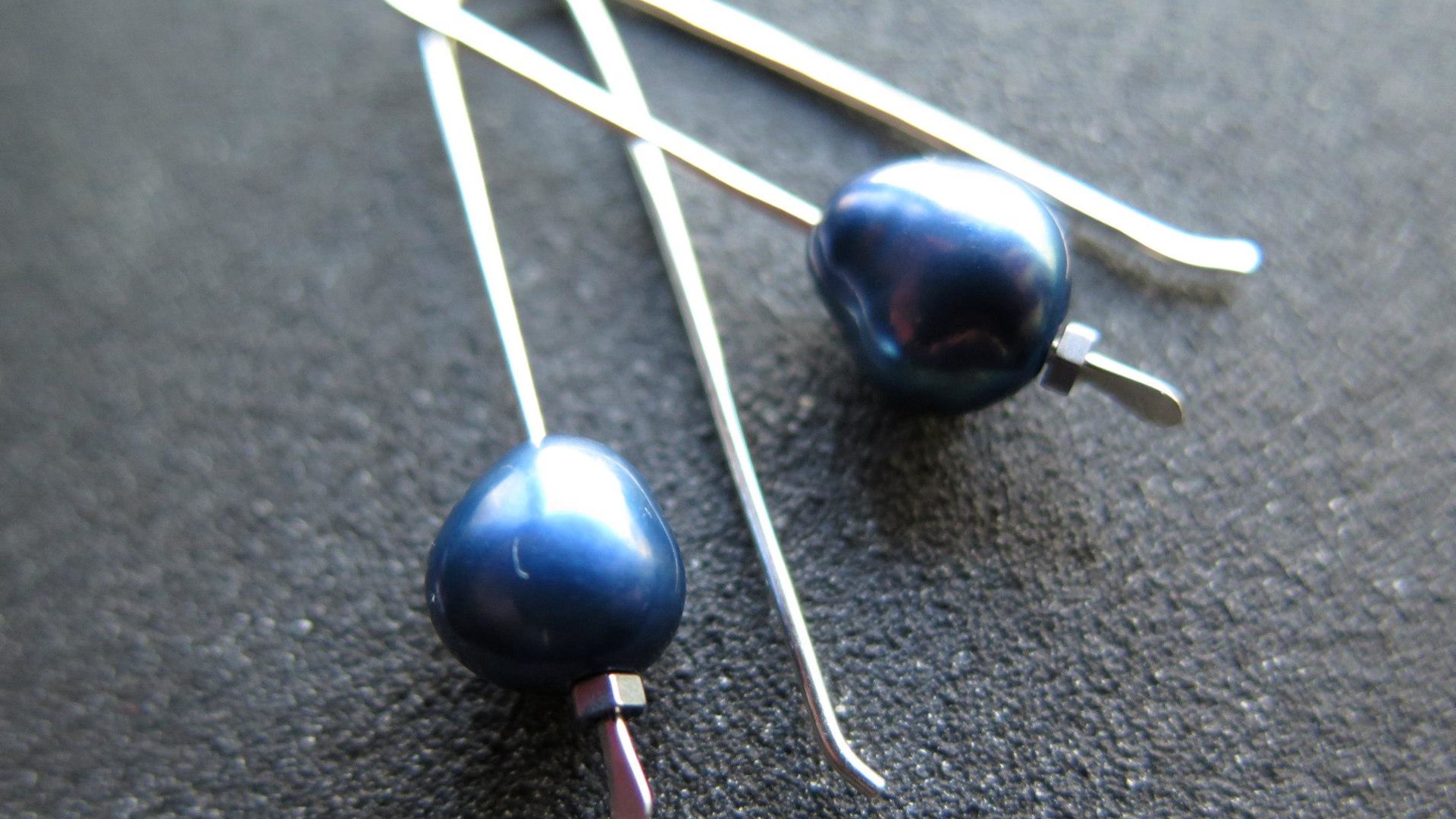 blue pearl earrings in sterling silver. modern freshwater pearl jewelry. 1 1/2” drop earrings. made in Calgary, Canada
