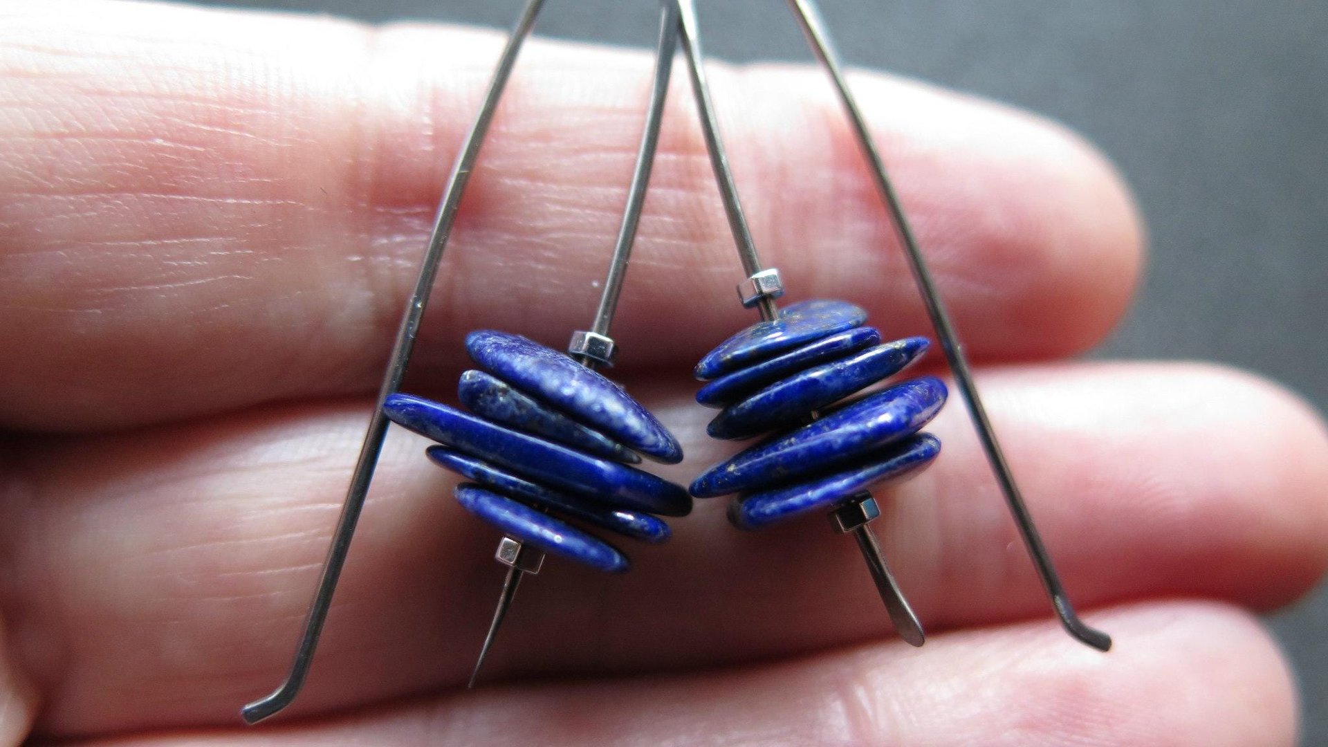 modern blue lapis earrings with hematite. grey niobium wires for sensitive ears. lapis lazuli jewellery.