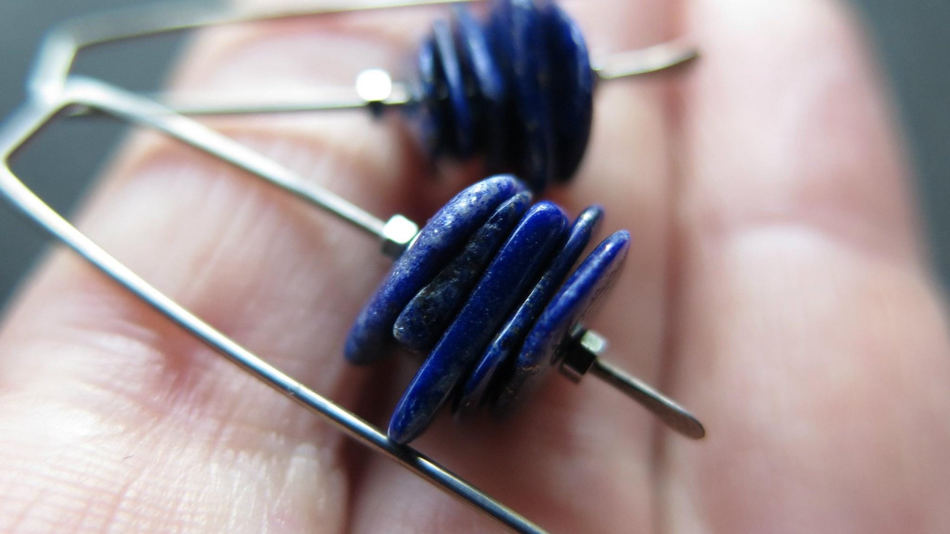 modern blue lapis earrings with hematite. grey niobium wires for sensitive ears. lapis lazuli jewellery.