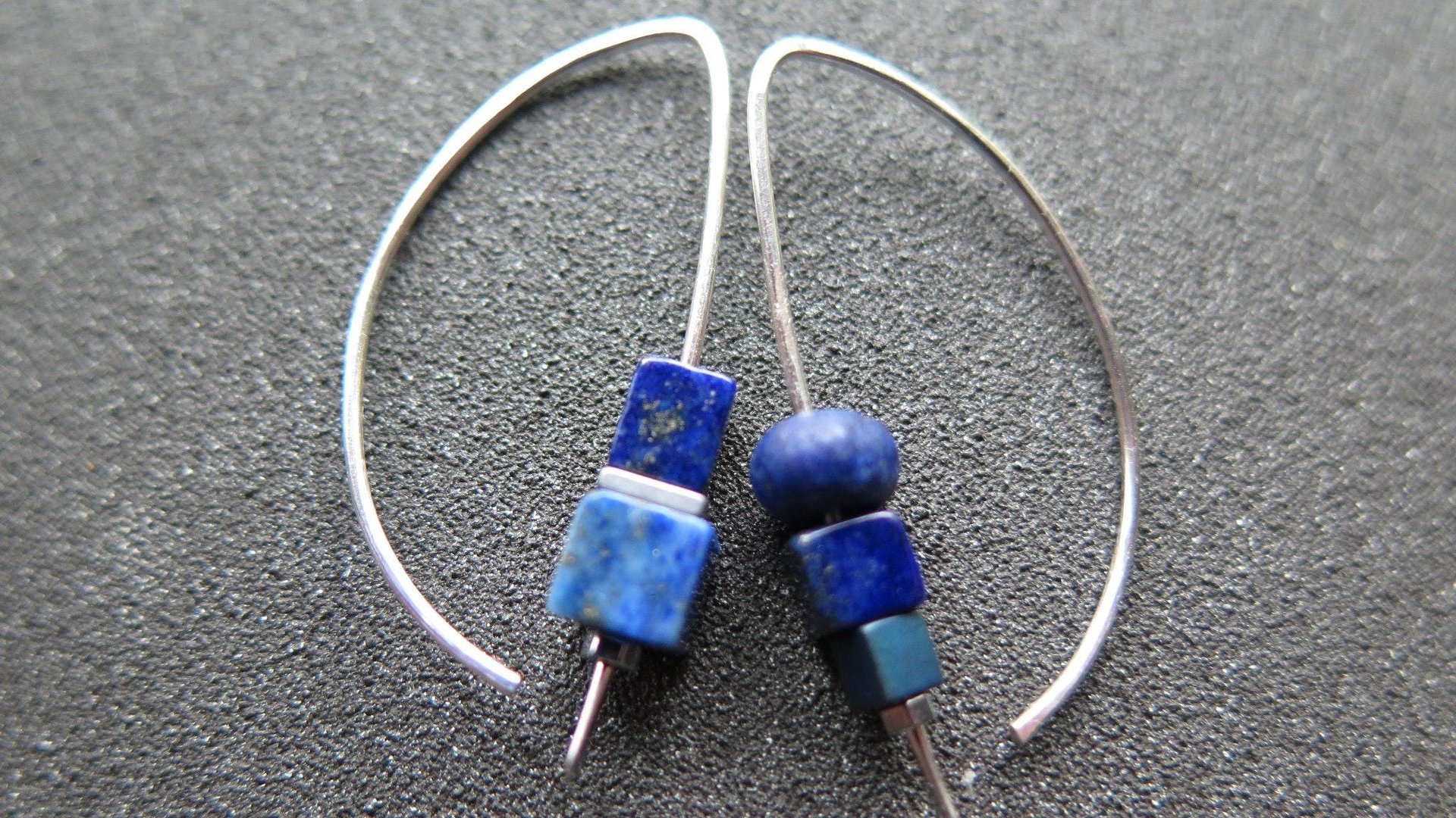 asymmetrical lapis lazuli earrings in sterling silver. modern blue earrings. blue gemstone jewelry. hematite jewellery.