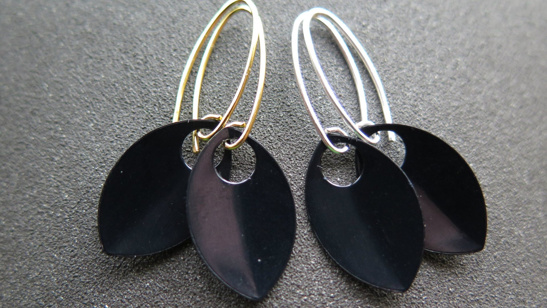 unique black dangle earring with gold earwires. modern anodized aluminum jewelry. splurge.