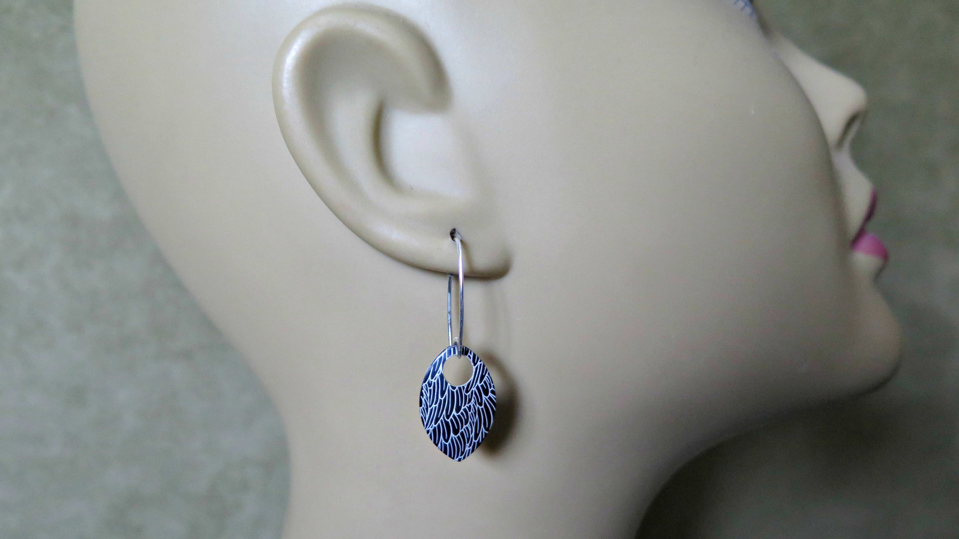 black wing earrings. anodized aluminum jewelry. sterling silver ear wire. splurge.