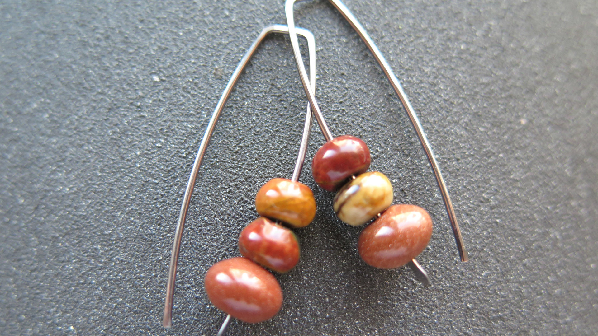 Custom order for MA of niobium earrings with crystals, hematite, jasper and goldstone. artisan jewelry, handmade in Calgary.