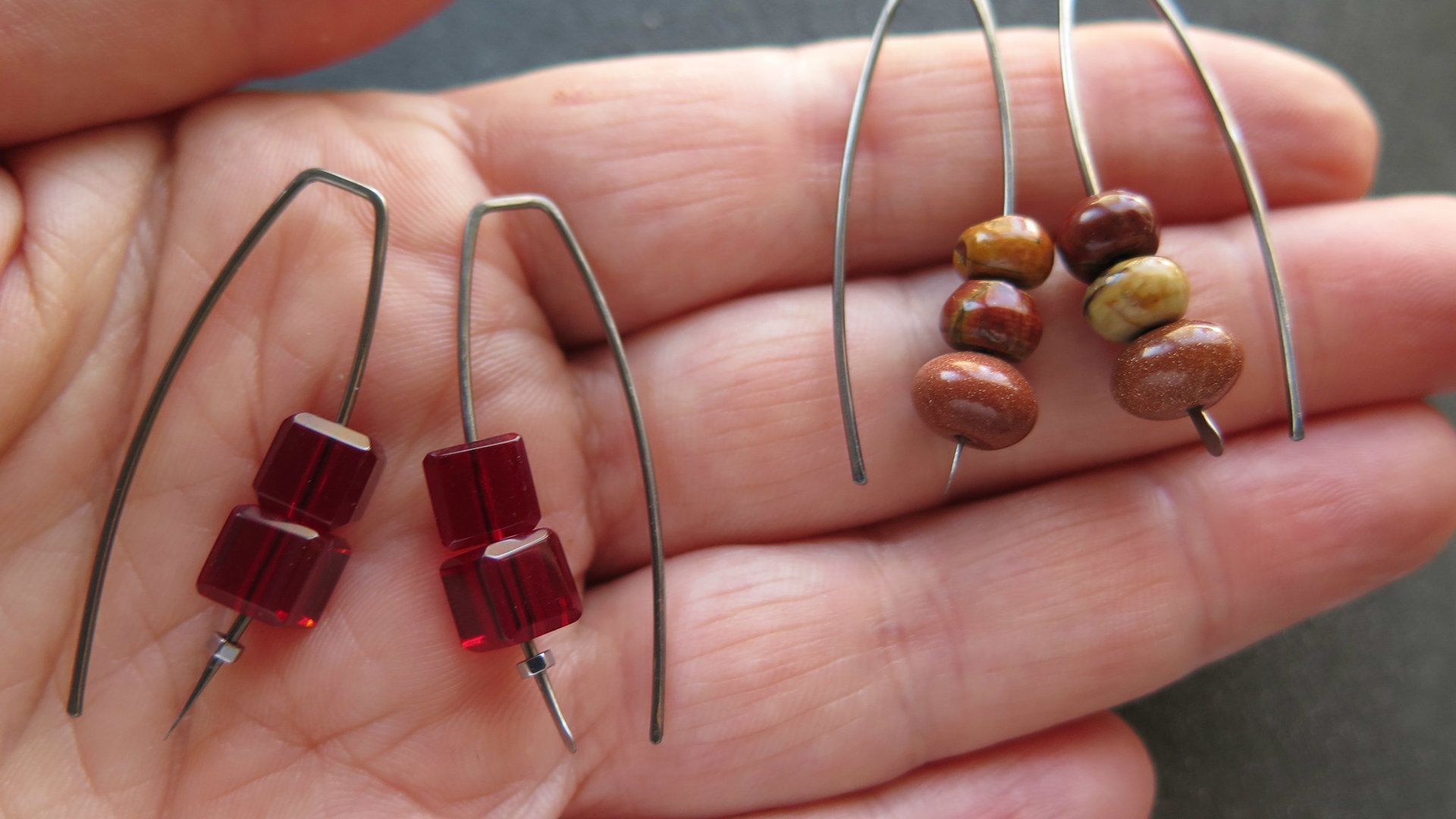 Custom order for MA of niobium earrings with crystals, hematite, jasper and goldstone. artisan jewelry, handmade in Calgary.