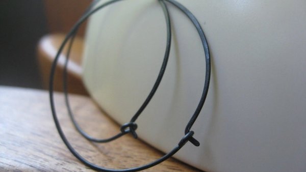 black hoop earrings. hammered niobium hoops. hypoallergenic jewelry. made in Calgary, Alberta.