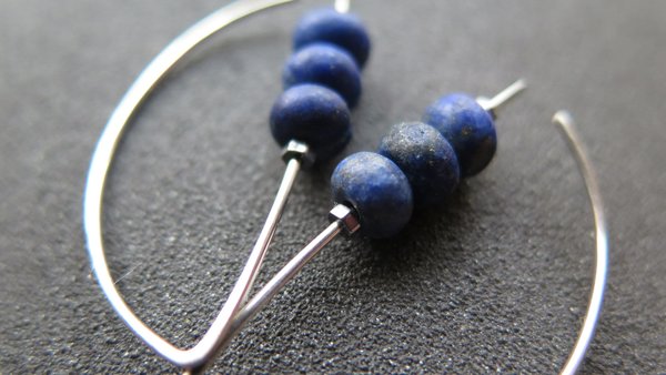 lapis earrings. cobalt blue earring. genuine lapis lazuli jewelry. dark blue stones with a matte polish.