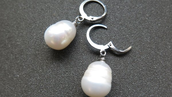 white pearl drop earrings. large freshwater pearl dangles. hypoallergenic stainless steel hoops. made in Canada.
