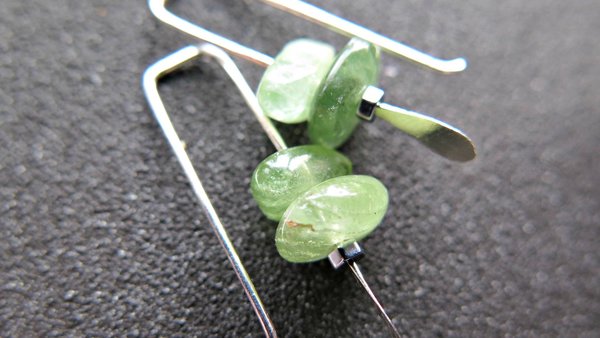 small peridot earrings. silver and green gemstone earrings. August birthstone. artisan jewelry. peridot nuggets.
