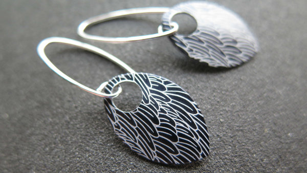black wing earrings. anodized aluminum jewelry. sterling silver ear wire. splurge.